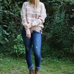 Women’s dark wash double frayed Kancan skinnies